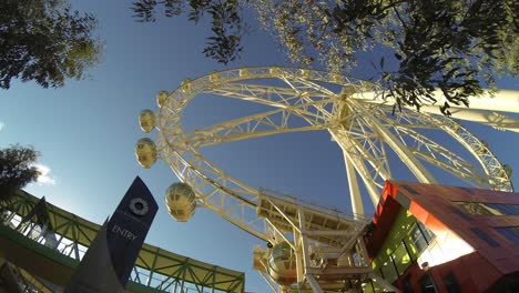 Melbourne-Star-Docklands-Melbourne-Ferris-Wheel-time-lapse-side-angle-looking-up-to-blue-sky