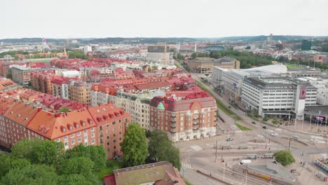 Aerial-video-of-beautiful-apartment-buildnings-near-Korsvagen-in-the-central-part-of-Gothenburg,-Sweden,-with-some-nice-green-trees-and-bushes-around-them