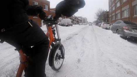 Hyper-lapse-Side-Angle-POV-Of-Courier-On-Radburro-Travelling-Along-Winter-Snow-Roads-In-Downtown-Montreal