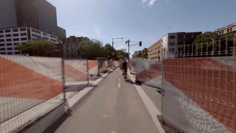 POV-Following-Cyclists-Along-Reseau-express-Velo-Past-Construction-Works-In-Montreal