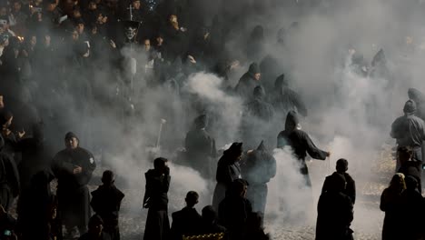 Men-In-Black-Robes-And-Hoods-Spreading-Incense-On-The-Street-Of-Antigua-During-Processions-Of-The-Holy-Week-In-Guatemala