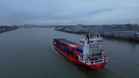 Huge-Cargo-carrier-tanker-navigating-a-fully-load-through-the-inland-canal-of-the-city-Dordrecht