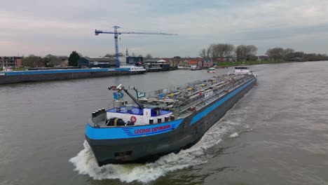 German-liquid-transport-ship-"Leonie-Deymann"-Navigating-through-the-canal-of-Zwijndrecht