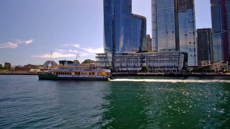 Ferries-and-touring-seacraft-offer-convenience-and-a-feast-for-the-eyes-on-and-around-the-Sydney-Harbour-area,-such-as-the-city's-beautiful-waterfront-and-the-iconic-Harbour-Bridge