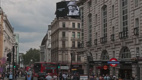 People-Walking-At-Piccadilly-Circus-During-The-Death-Of-Queen-Elizabeth-II-In-London,-England,-UK