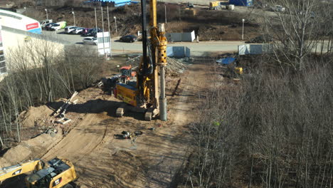 Hydraulic-drilling-machine-boring-into-ground-at-dig-site-in-Brno-city