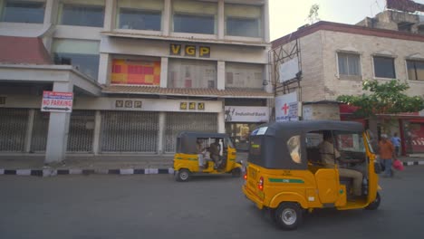 Autorickshaws-or-Tuk-Tuk-on-the-streets,-roads-of-Chennai,-Side-view