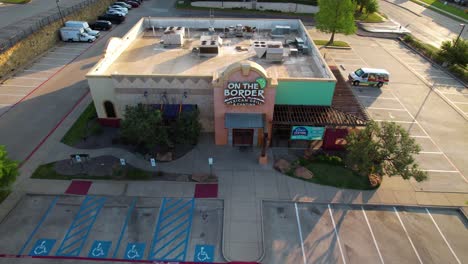 Editorial-Aerial-footage-of-the-On-the-Border-storefront-in-Denton-Texas