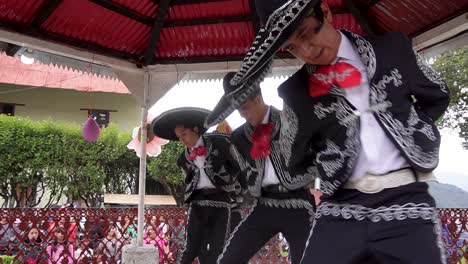 slow-motion-shot-of-mexican-dancing-with-traditional-mariachi