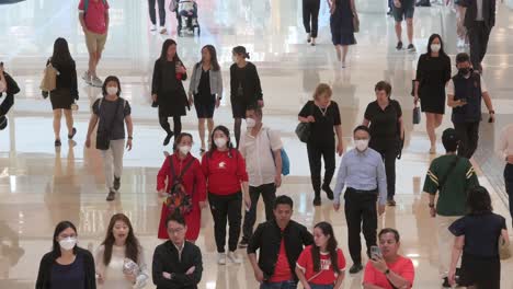 Chinese-customers-walk-through-a-high-end-shopping-mall-as-they-shop-for-multinational-retail-brands