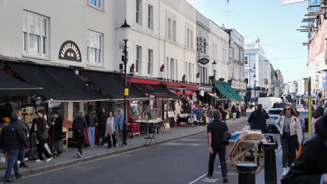 Tourists-and-locals-shopping-in-the-stores-of-Portobello-street-in-Notting-Hill