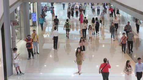 Shoppers-walk-through-a-high-end-shopping-mall-as-they-look-for-multinational-retail-branded-products