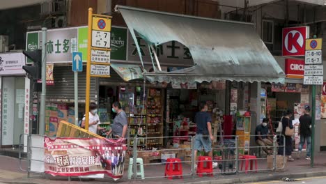 Typhoon-aftermath-as-a-store's-awning-seen-damaged-by-strong-winds