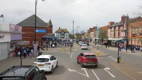 Skegness-High-Street,-a-bustling-thoroughfare-in-the-seaside-town-of-Skegness,-Lincolnshire