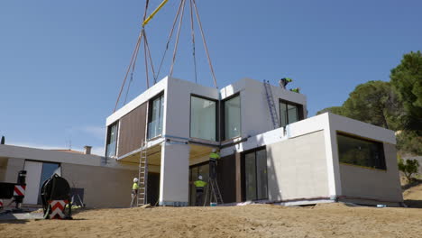Construction-site-of-modular-house-building,-motion-view