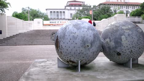 The-West-statue-on-the-campus-of-the-University-of-Texas-in-Austin,-Texas-with-gimbal-video-circling