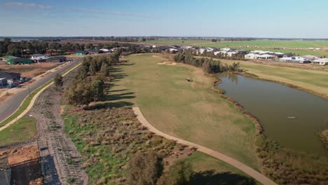 Yarrawonga,-Victoria,-Australia---14-May-2023:-Over-Black-Bull-Golf-Course-to-new-residential-stage-with-houses-under-construction-at-Silverwoods-Estate-in-Yarrawonga-Victoria