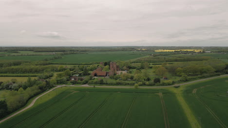 A-Drone's-Eye-View-of-Layer-Marney-Tower-and-Surrounding-Countryside,-forward-drone-motion