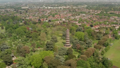 Slow-wide-descending-aerial-shot-towards-Kew-Gardens-Chinese-Pagoda