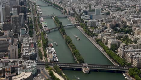 Handheld-panoramic-view-of-the-Seine-River-from-the-top-of-the-Eiffel-Tower-west-wing,-Paris-France