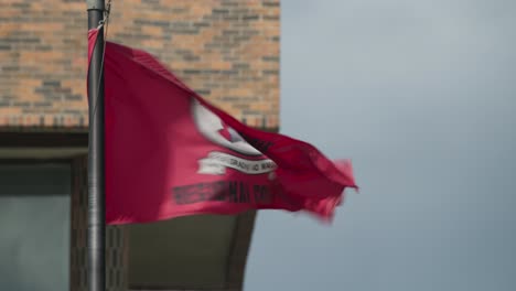 Grande-Prairie-Regional-College-GPRC-flag-waving-in-wind