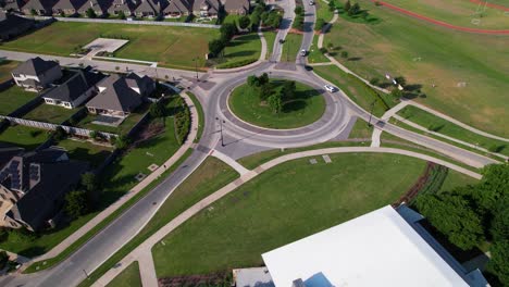 This-is-an-aerial-video-of-a-roundabout-or-traffic-circle-near-Union-Park-in-Aubrey-Texas