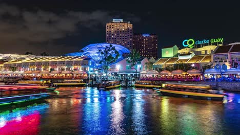 Time-lapse-of-boats-from-Singapore-river-cruise-moving-along-at-Clarke-quay,-as-they-ferry-passengers-along-the-river