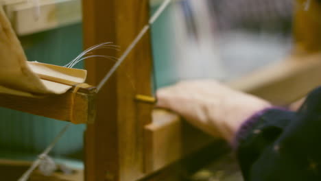 Old-hand-picked-thread-to-use-on-traditional-loom-in-Kyoto,-Japan