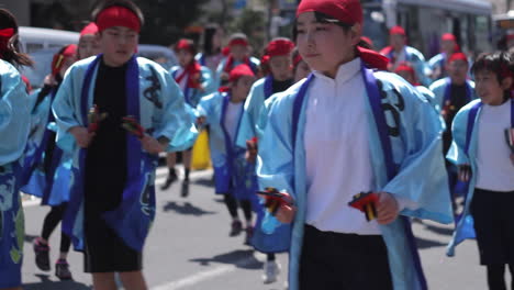 Young-people-performing-at-a-street-festival-in-Kamakura,-Japan