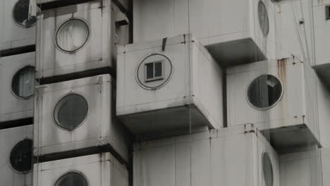 Close-up-view-on-small-section-of-room-pods-in-the-Nakagin-Capsule-Tower