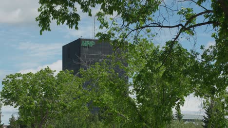 MNP-Office-Building-in-Grande-Prairie-Alberta-shot-from-a-distance-with-trees-in-the-foreground