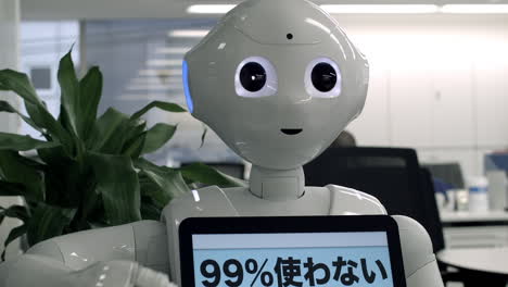 Pepper-Robot-Assistant-with-Information-screen-at-an-office-showing-the-display-with-the-information