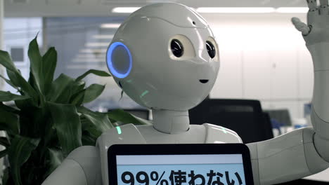 Pepper-robot-lifts-hands-and-shaking-head