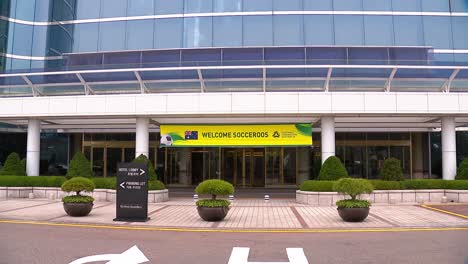 Tilt-down-to-the-'Welcome-Socceroos'-sign-on-the-Haeundae-Grand-Hotel