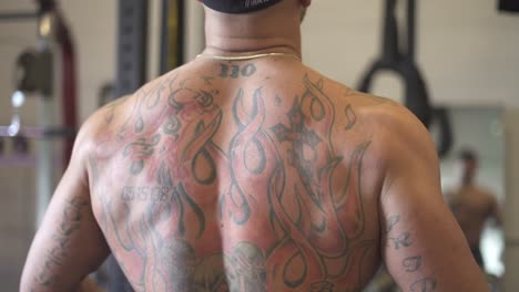 A-jacked-guys-back-with-a-bunch-of-tattoo's