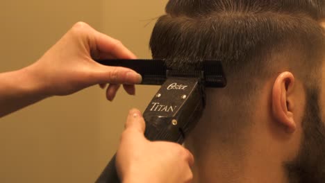 A-man-getting-a-haircut-in-a-nice-barber-shop