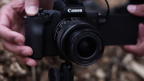 A-canon-DSLR-being-set-up-to-record-a-vlog