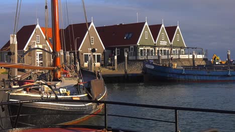 Texel-Picturesque-Harbour-with-floating-boats-and-wooden-houses-in-the-Netherlands---Wide-Static-shot