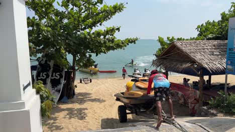 Loading-Jet-Ski-onto-Water-on-Bophut-Beach-in-Koh-Samui,-Thailand
