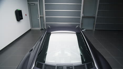 Close-Up-Rear-View-Of-Brand-New-Audi-R8-Super-Sports-Car-Mythos-Black-With-Spoiler