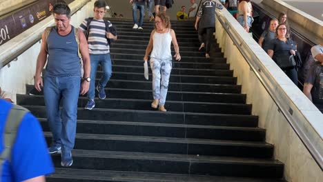 Peoples-are-using-escalator-and-staircase-inside-of-a-shopping-mall