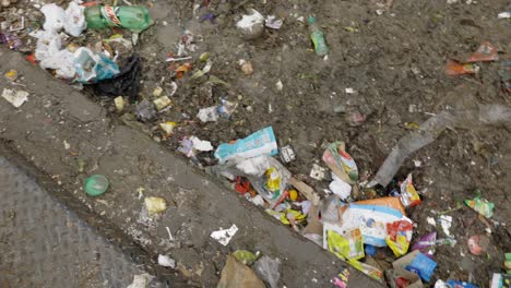 Street-full-of-Trash,-Pollution,-India