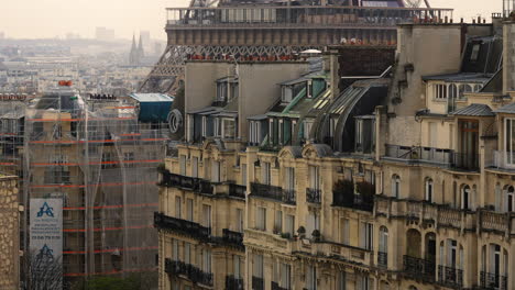Rooftop-Panoramic-View-of-Paris-Cityscape-and-Urban-Buildings-Next-to-Eiffel-Tower
