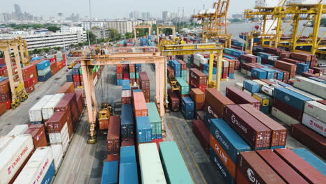 Aerial-shot-of-Container-Yard,-Gantry-Cranes-in-Container-Port-Sea-Cargo-Port-and-Container-Terminal-of-Bangkok-Port-in-Thailand