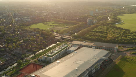 Dolly-back-reveal-aerial-shot-over-Here-East-Building-Stratford-London