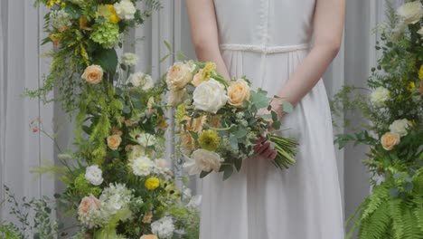 Bride-is-holding-a-flower-bouquet