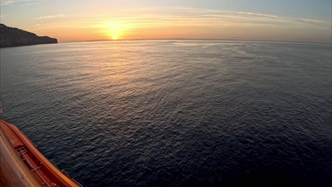 Timelapse-of-tender-being-prepared-on-a-cruise-ship-while-sun-rises-near-Madeira
