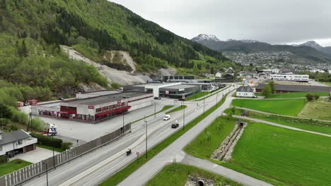Car-dealers-in-Forde-Norway---Aerial-showing-Berge-and-co-and-other-dealers-with-forde-town-in-background