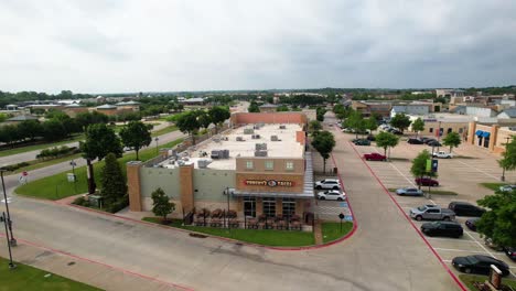 Editorial-aerial-footage-of-Torchy's-Tacos-in-Highland-Village-Texas-located-at-1601-Village-Pkwy-Ste-K110,-Highland-Village,-TX-75077