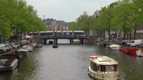 Amsterdam-daytime-canal-and-street-scene